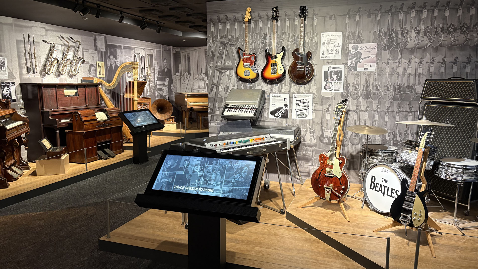Guitars, drums, and vintage instruments on display in the galleries, ready for you to plan your visit
