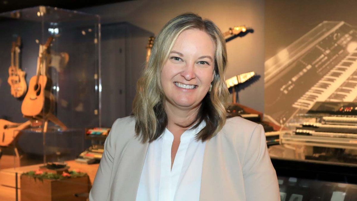 Katherine Palmer, Executive Director of the Museum of Making Music, standing in the galleries